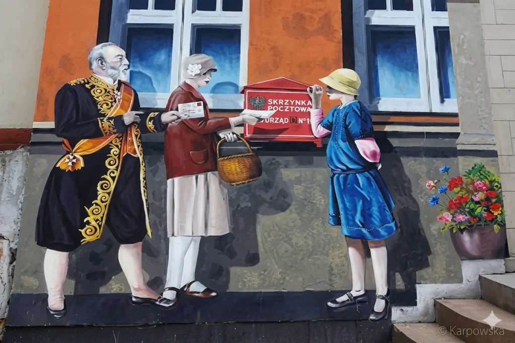 Hochauflösendes Wandgemälde (Mural) von Heinrich von Stephan in Stolp (Słupsk) – Darstellung der ersten Postkarte.